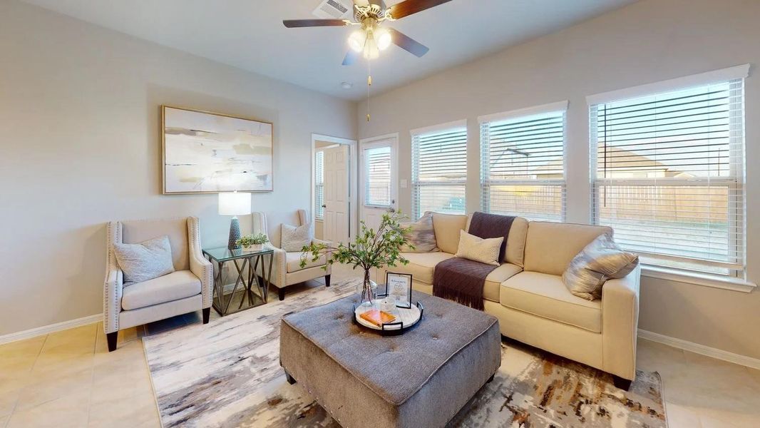 Furnished interior view inside a new home in Sunterra, Katy (Image 9).