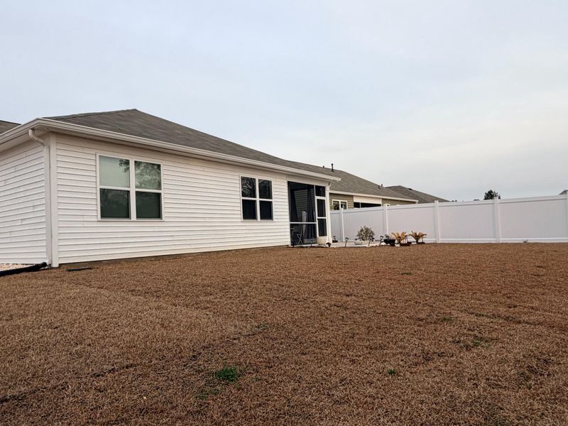 Exterior details and patio area of a home in , Longs (Image 30).