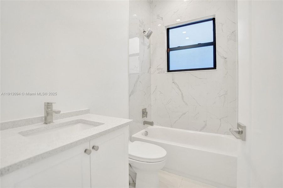 Furnished interior view inside a new home in Apex at Avenir, Palm Beach Gardens (Image 9).