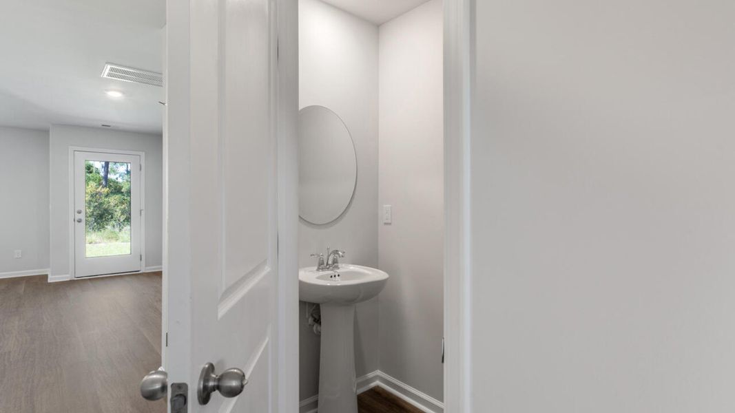 Furnished interior view inside a new home in Waterside Townhomes, Surf City (Image 10).