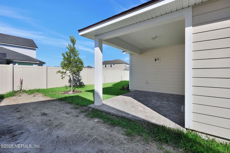 Exterior details and patio area of a home in Crosswinds at Nocatee, Ponte Vedra Beach (Image 30). Exterior details and patio area of a home in Crosswinds at Nocatee, Ponte Vedra Beach (Image 30).