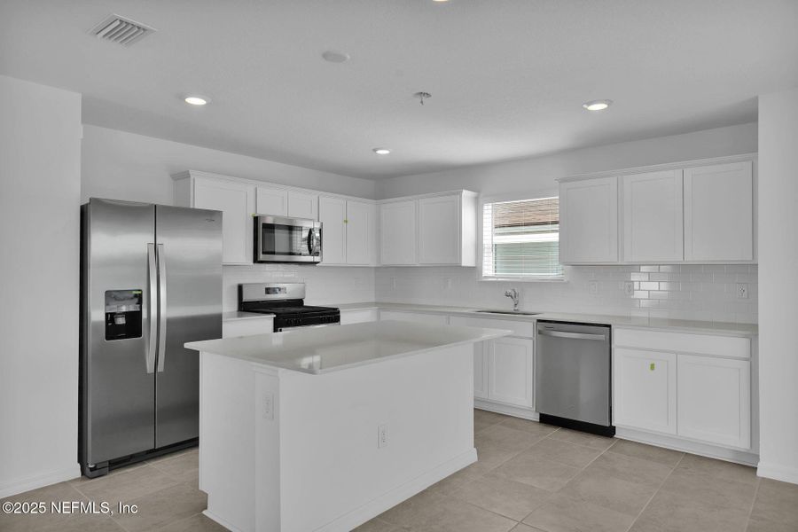 Furnished interior view inside a new home in Wells Landing, Jacksonville (Image 6).