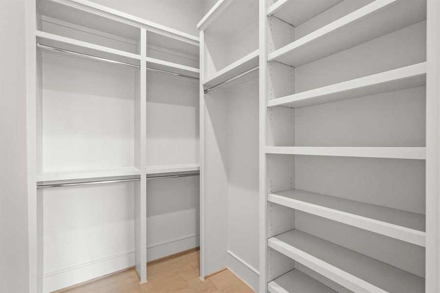 The walk-in closet offers tons of storage!