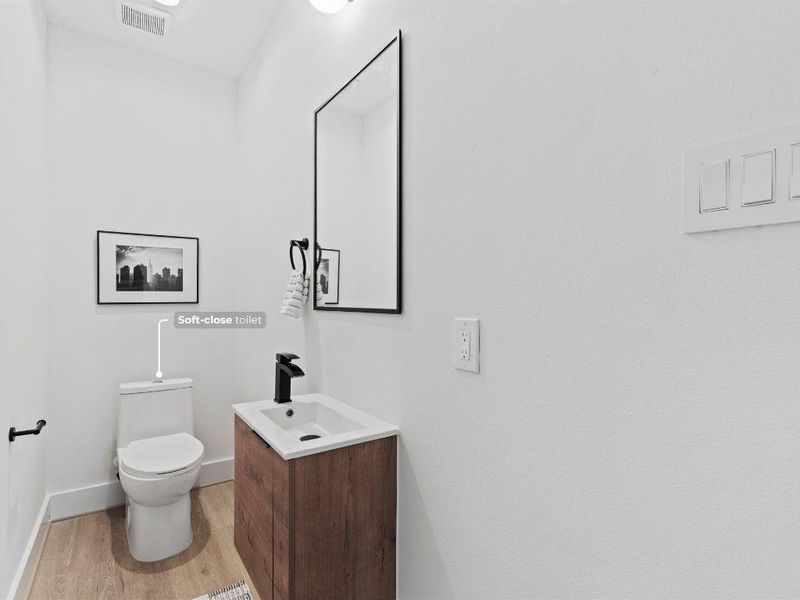 Convenient powder bath on the main floor—perfect for guests to freshen up.