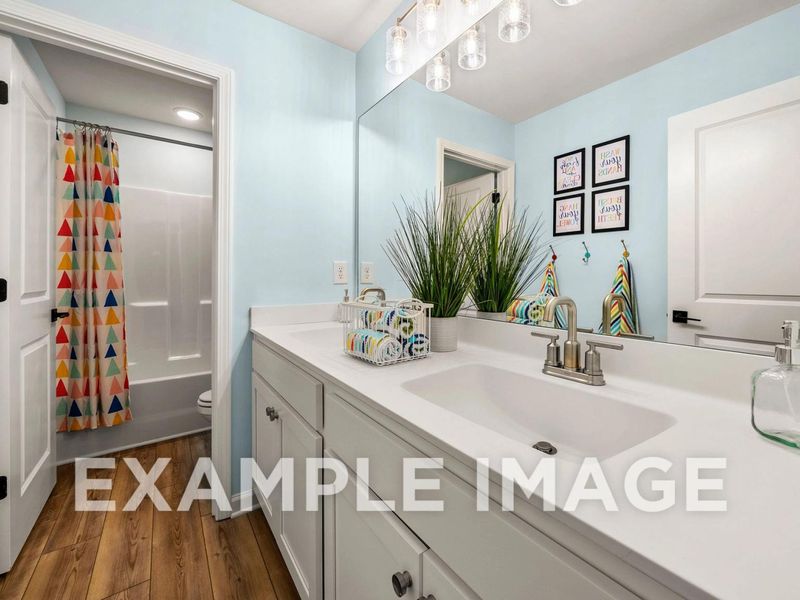 Representative furnished interior of a home built from the The Hickory B by Davidson Homes LLC in Melody Lakeside Estates, Buford (Image 41).