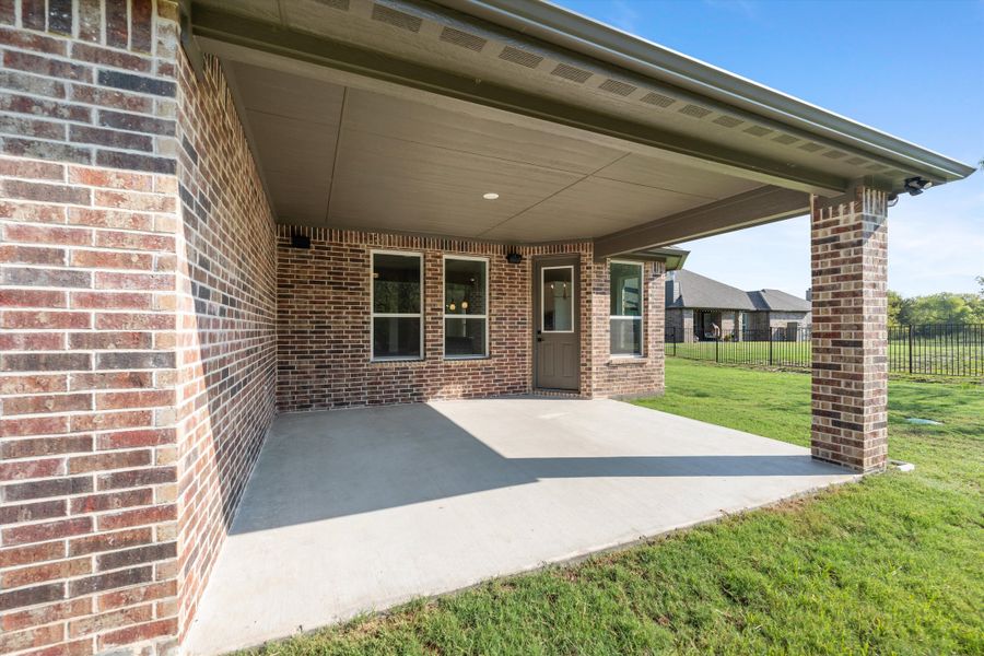 Exterior details and patio area of a home in Vista Oaks Estates, Royse City (Image 24). Exterior details and patio area of a home in Vista Oaks Estates, Royse City (Image 24).