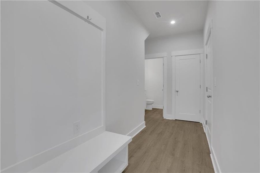 Spacious, unfurnished interior of a new home in The Paddocks at Doc Hughes, Buford (Image 27).