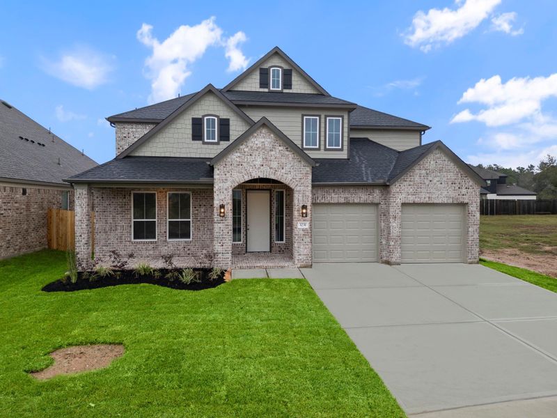 Front exterior of a new home in Barton Creek Ranch, Conroe, TX, highlighting curb appeal (Image 1). Front exterior of a new home in Barton Creek Ranch, Conroe, TX, highlighting curb appeal (Image 1).