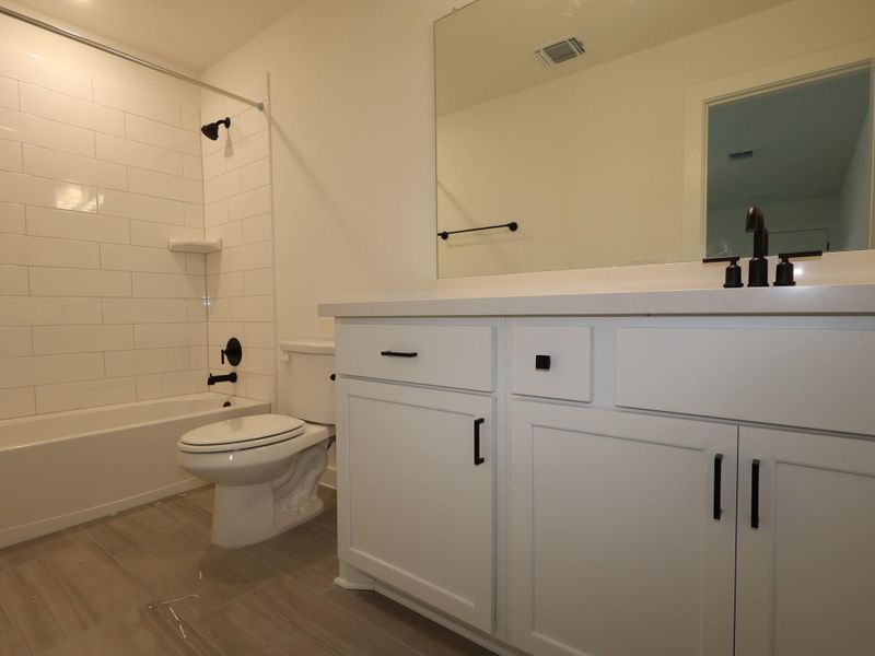 Furnished interior view inside a new home in Barksdale, Leander (Image 9). Furnished interior view inside a new home in Barksdale, Leander (Image 9).