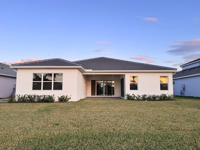 Exterior details and patio area of a home in Westlake, Loxahatchee (Image 3).