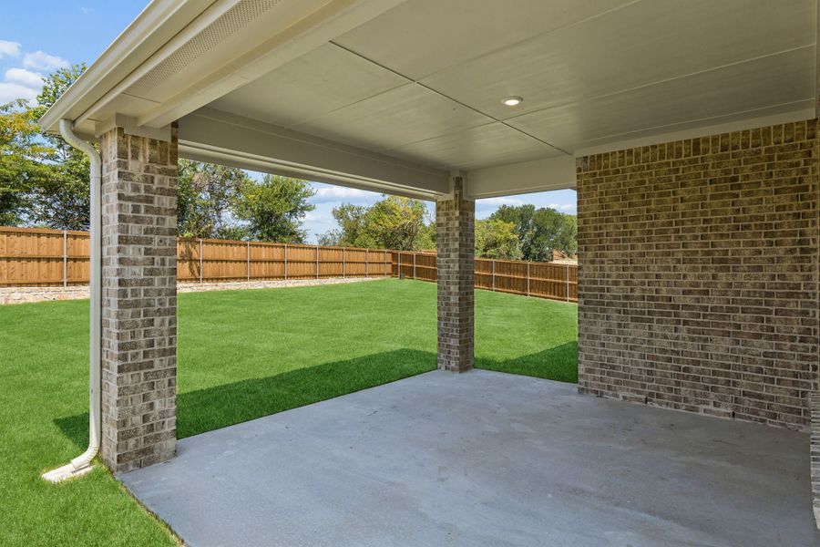 Exterior details and patio area of a home in Rainwater Crossing, Celina (Image 22). Exterior details and patio area of a home in Rainwater Crossing, Celina (Image 22).
