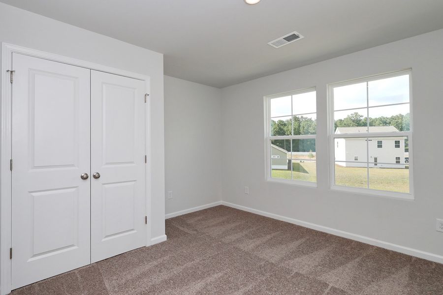 Spacious, unfurnished interior of a new home in Hainer Place, Conway (Image 22).