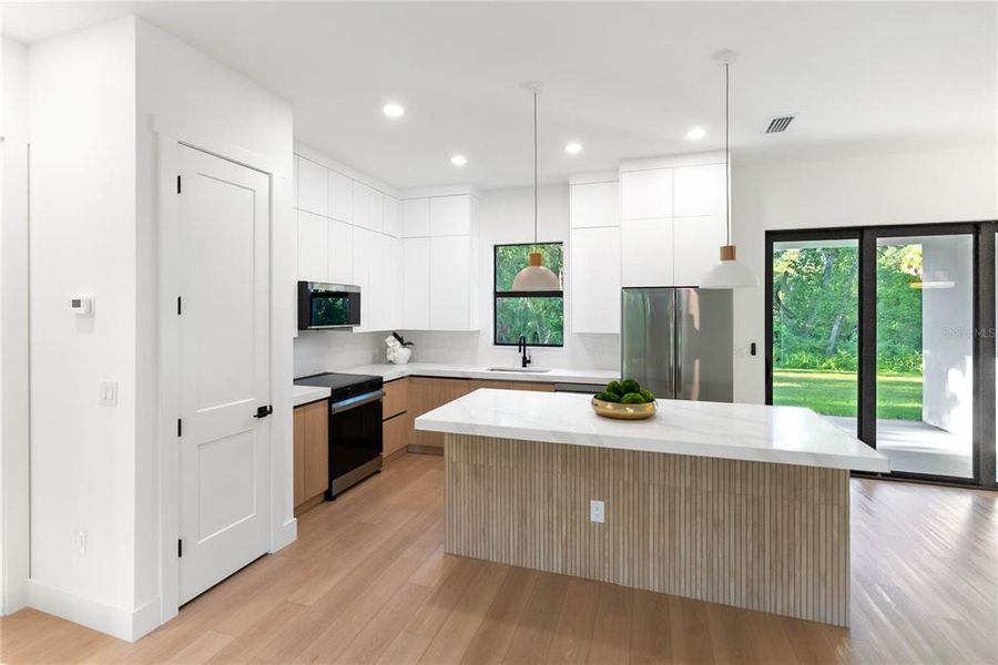Furnished interior view inside a new home in , Port Charlotte (Image 11).
