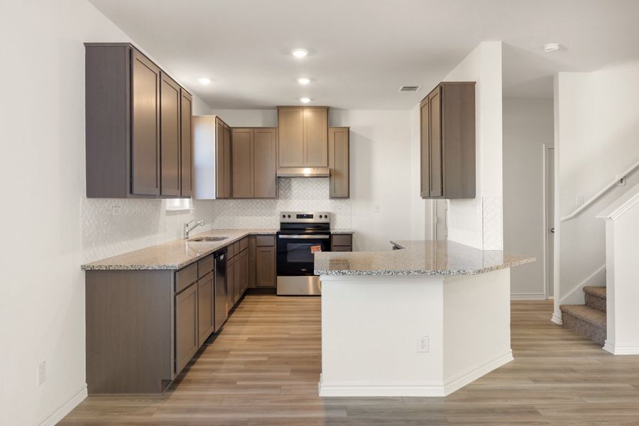 Furnished interior view inside a new home in The Granary - Heritage Collection, San Antonio (Image 5).