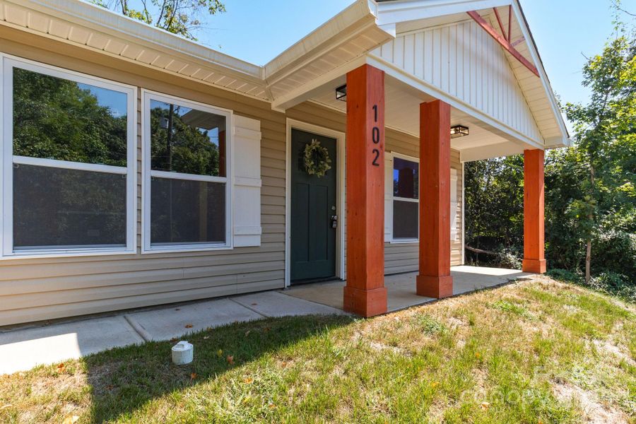 Front exterior of a new home in , Lexington, NC, highlighting curb appeal (Image 15).