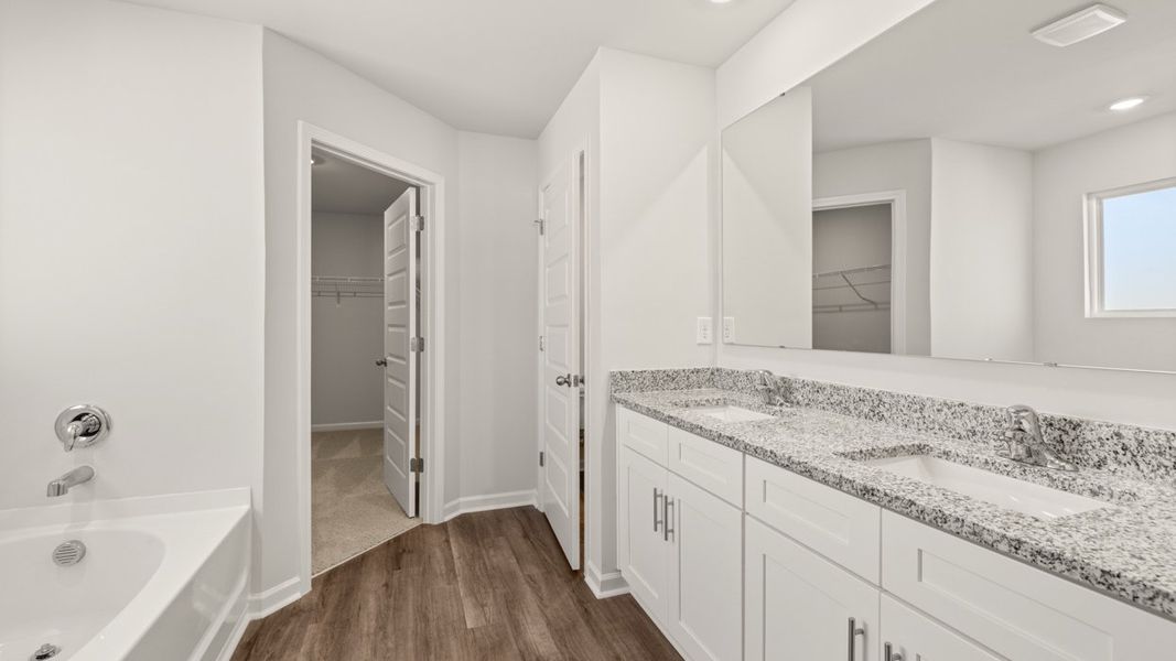 Representative furnished interior of a home built from the Mansfield by D.R. Horton in Southwind Village, Evans (Image 13).