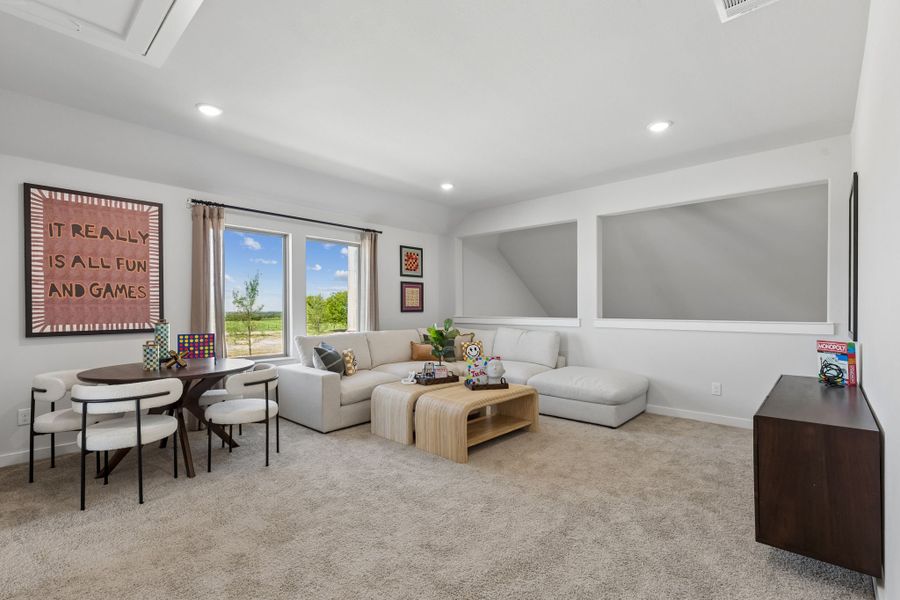Game Room in a Sunset Ranch Winters Model Home in Gunter TX by Trophy Signature Homes