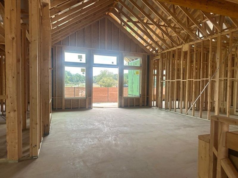 Miscellaneous room featuring vaulted ceiling