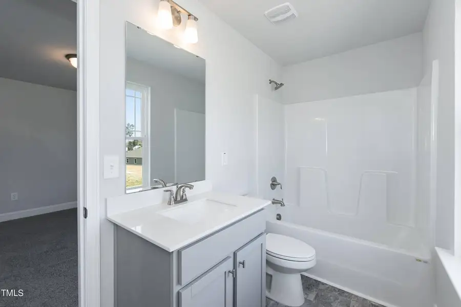 Representative furnished interior of a home built from the 2721 by Adams Homes in Hidden Pines, Cameron (Image 9).