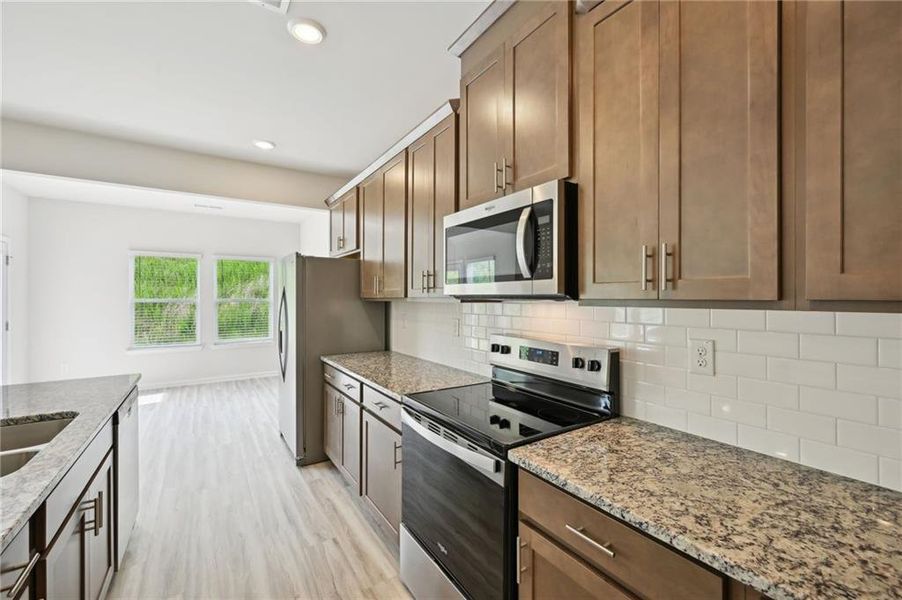 Furnished interior view inside a new home in Hawthorne Station, College Park (Image 4).