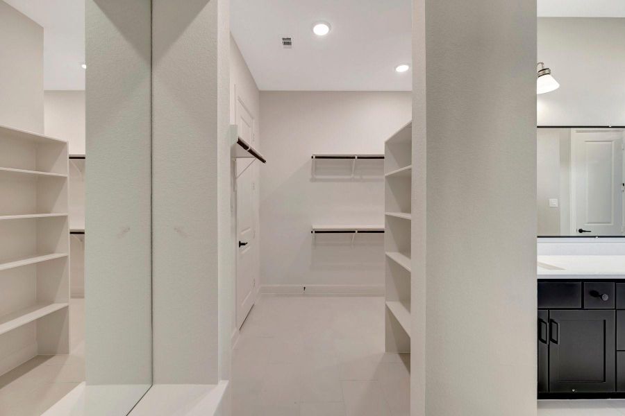 Built in mirror provides privacy to closet and tile floors are convenient for maintaining cleanliness!