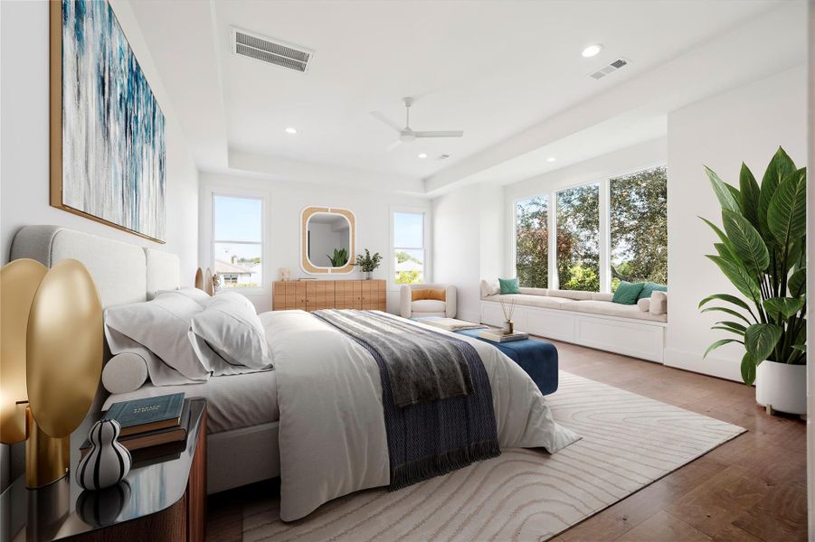 Fantastic primary suite with tray ceilings enjoys tree top views, a window seat (with storage) and fabulous en suite bathroom. *Virtually staged. Fantastic primary suite with tray ceilings enjoys tree top views, a window seat (with storage) and fabulous en suite bathroom. *Virtually staged.