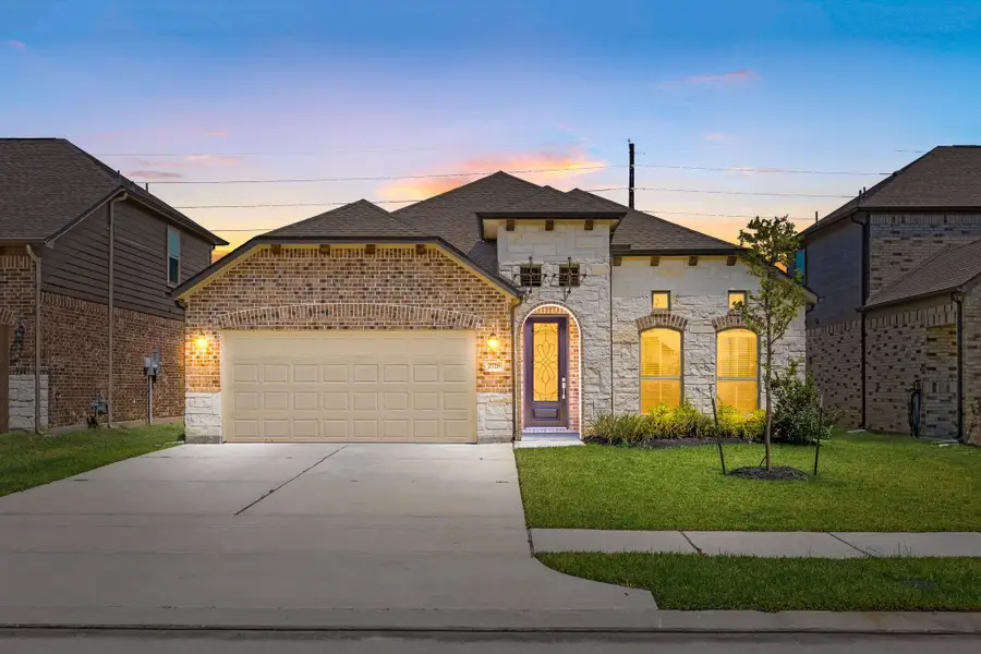 Front exterior of a new home in Morton Creek Ranch, Katy, TX, highlighting curb appeal (Image 1). Front exterior of a new home in Morton Creek Ranch, Katy, TX, highlighting curb appeal (Image 1).