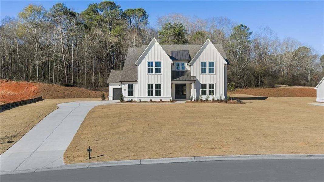 Front exterior of a new home in , Gainesville, GA, highlighting curb appeal (Image 26).