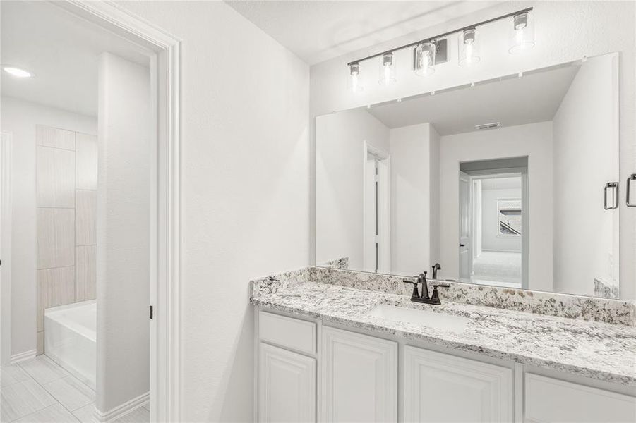 Furnished interior view inside a new home in Chaparral Park, Oak Point (Image 10). Furnished interior view inside a new home in Chaparral Park, Oak Point (Image 10).
