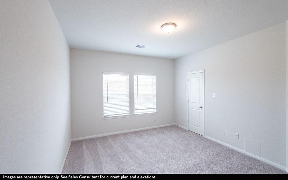 Unfurnished room featuring visible vents, baseboards, and carpet flooring