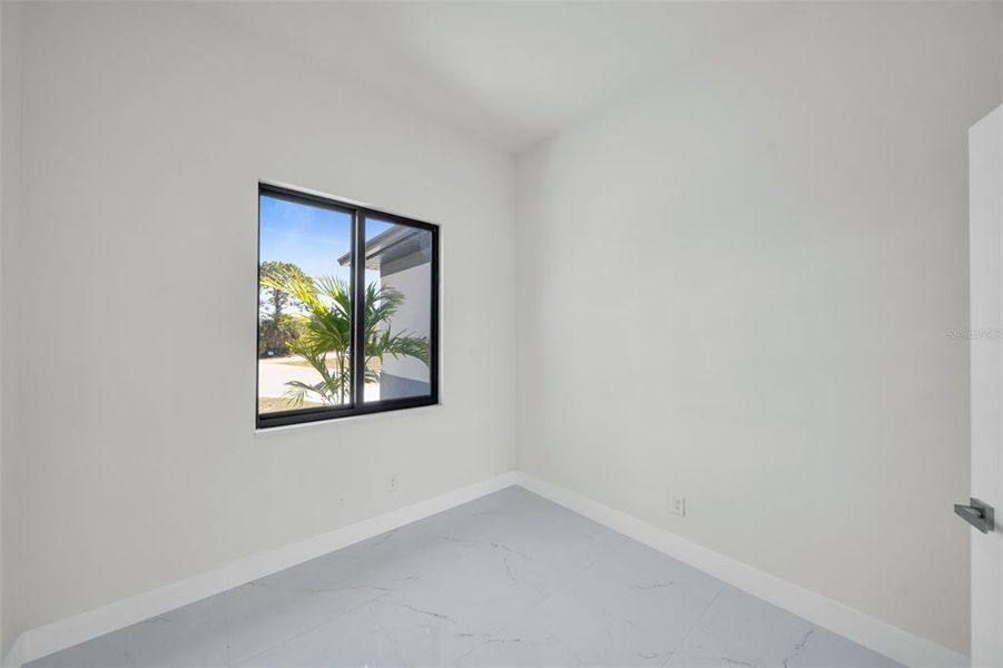 Spacious, unfurnished interior of a new home in , Port Charlotte (Image 18).