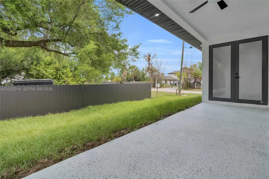 Exterior details and patio area of a home in , Lehigh Acres (Image 4).