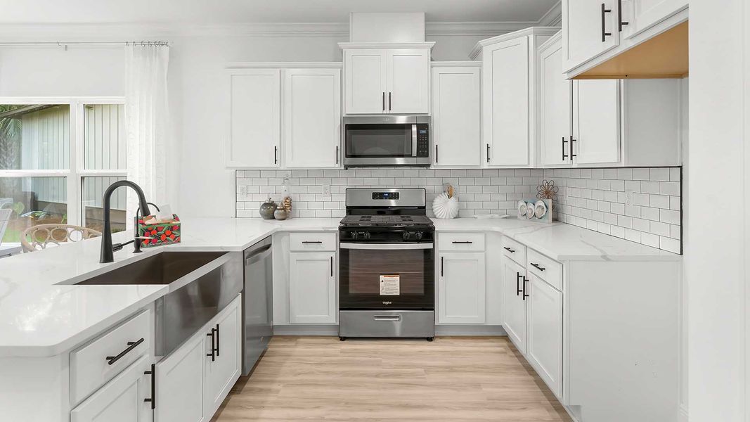 Furnished interior view inside a new home in Colonial East, Panama City Beach (Image 7).