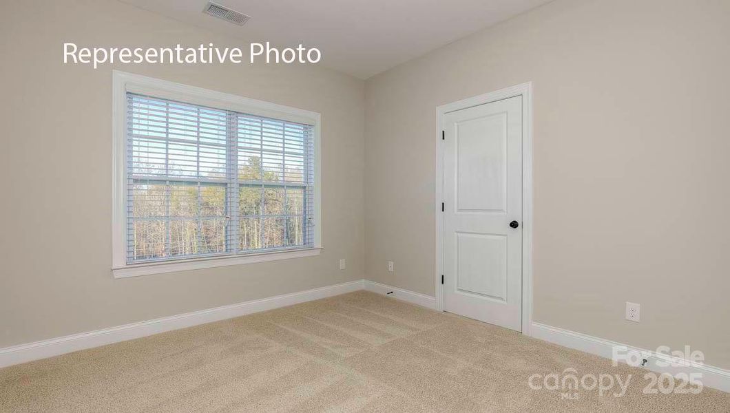 Spacious, unfurnished interior of a new home in Sanctuary at Southgate, Indian Trail (Image 26).