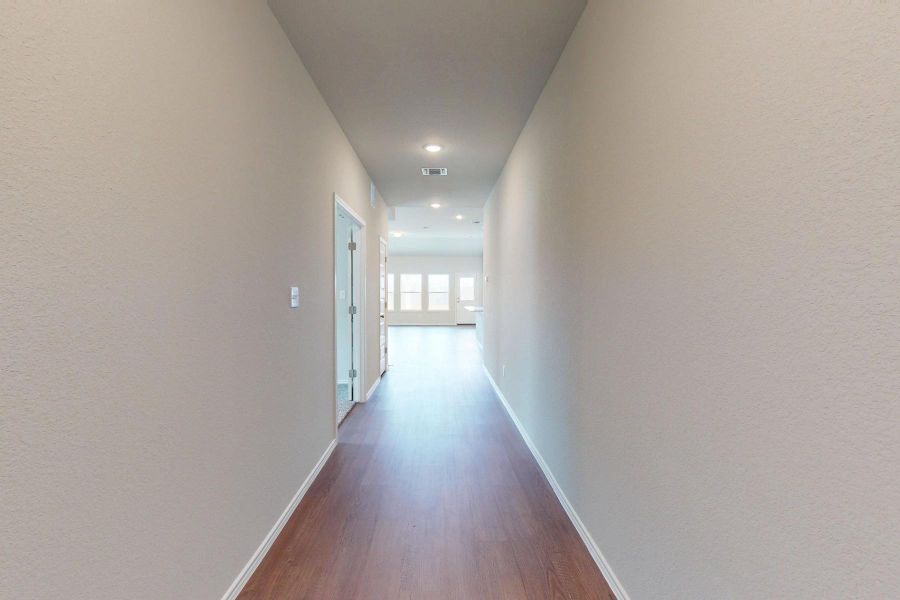 Spacious, unfurnished interior of a new home in Carillon, Manor (Image 25).