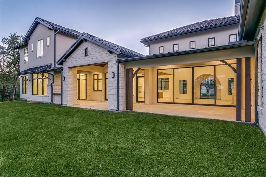 This home has a beautiful rear elevation as well.