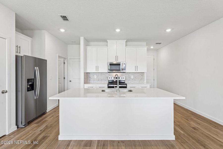Furnished interior view inside a new home in Parkside at Shearwater, St. Augustine (Image 6).