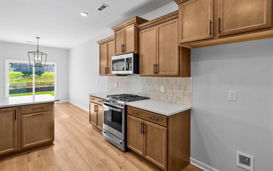 Furnished interior view inside a new home in Fieldstone, Lexington (Image 8).