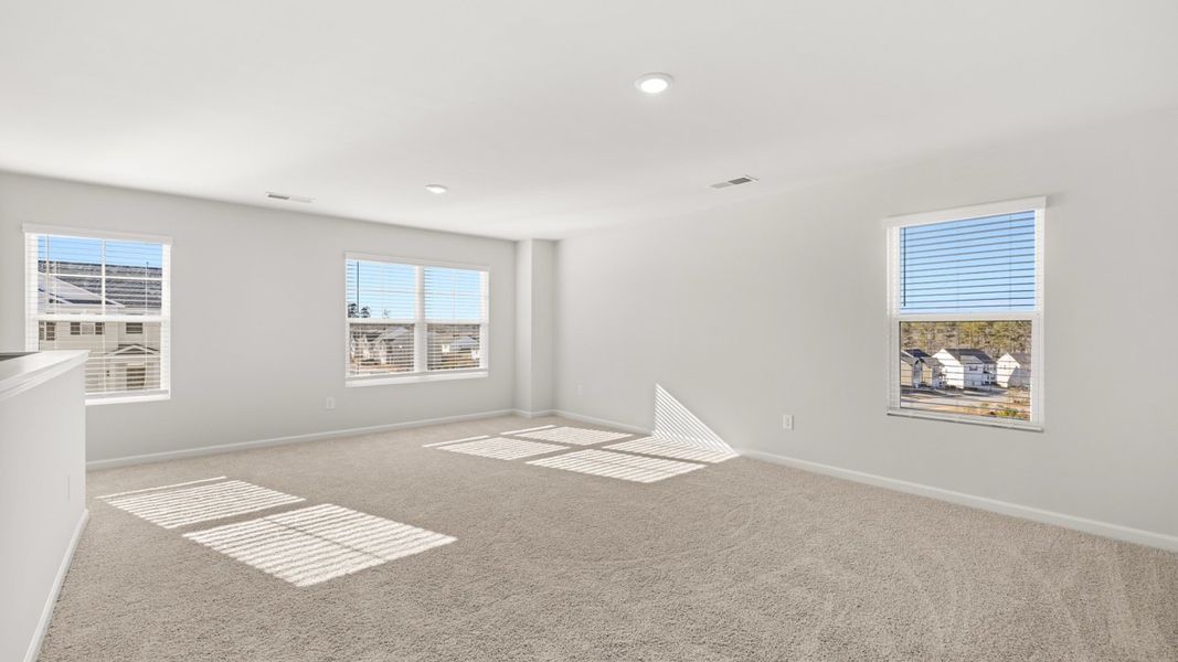 Representative unfurnished interior of a home built from the Elle by D.R. Horton in Estates at Deer Hollow, Grovetown (Image 21). Representative unfurnished interior of a home built from the Elle by D.R. Horton in Estates at Deer Hollow, Grovetown (Image 21).