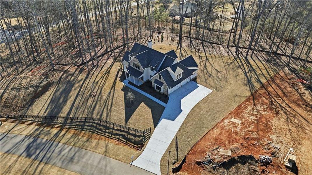Front exterior of a new home in , Canton, GA, highlighting curb appeal (Image 27).