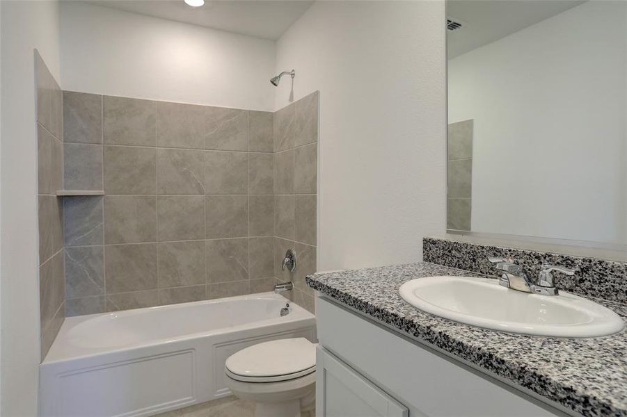 Full bathroom with vanity and shower / bathtub combination