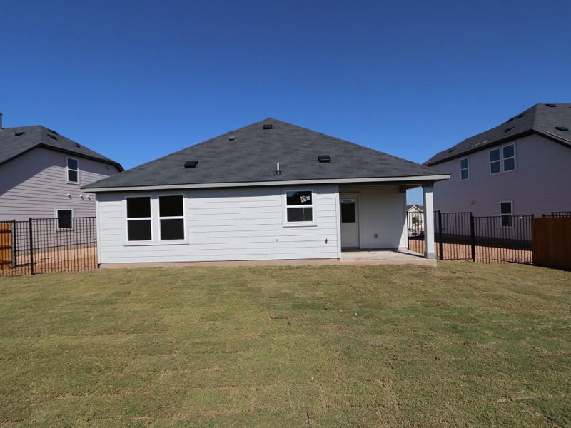 Exterior details and patio area of a home in Cascades at Onion Creek, Austin (Image 4).