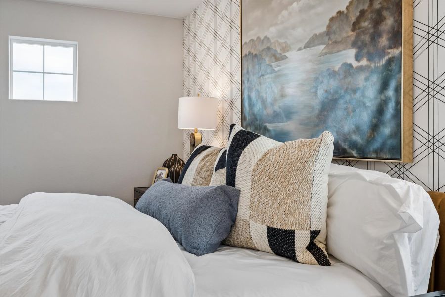 A bed with pillows. A bed with pillows.