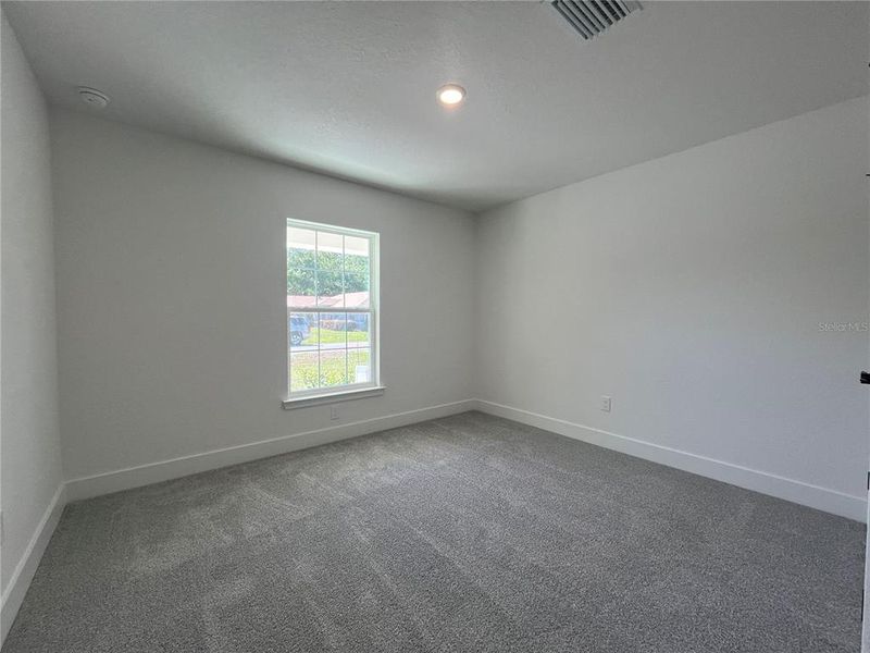 Spacious, unfurnished interior of a new home in Orange Blossom Hills, Summerfield (Image 12).