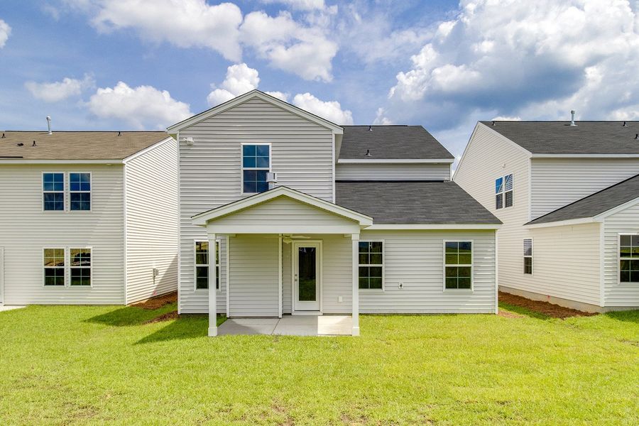 Front exterior of a new home in Winston Point, Gilbert, SC, highlighting curb appeal (Image 19). Front exterior of a new home in Winston Point, Gilbert, SC, highlighting curb appeal (Image 19).