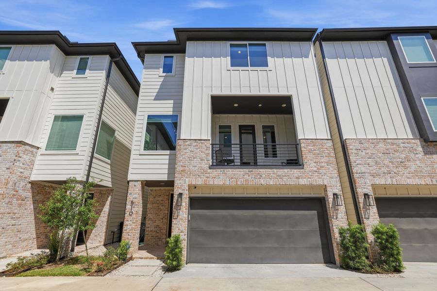 Front exterior of a new home in , Houston, TX, highlighting curb appeal (Image 25).