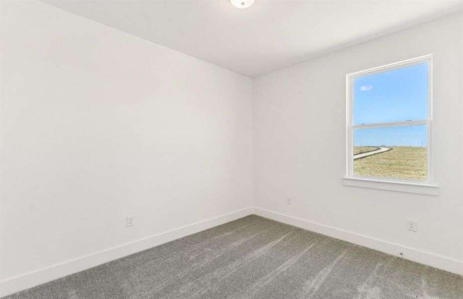 Comfortable bedroom with a bright window view