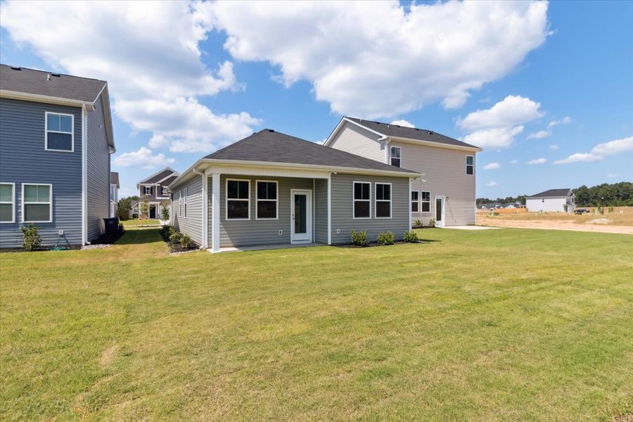 Front exterior of a new home in Windsor, North Augusta, SC, highlighting curb appeal (Image 18). Front exterior of a new home in Windsor, North Augusta, SC, highlighting curb appeal (Image 18).