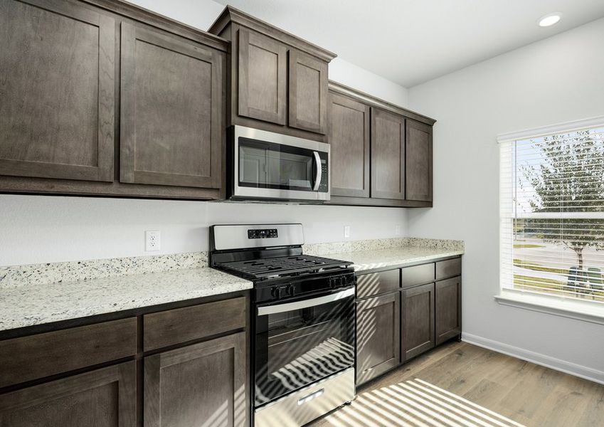 The kitchen of the Driftwood has beautiful granite countertops.