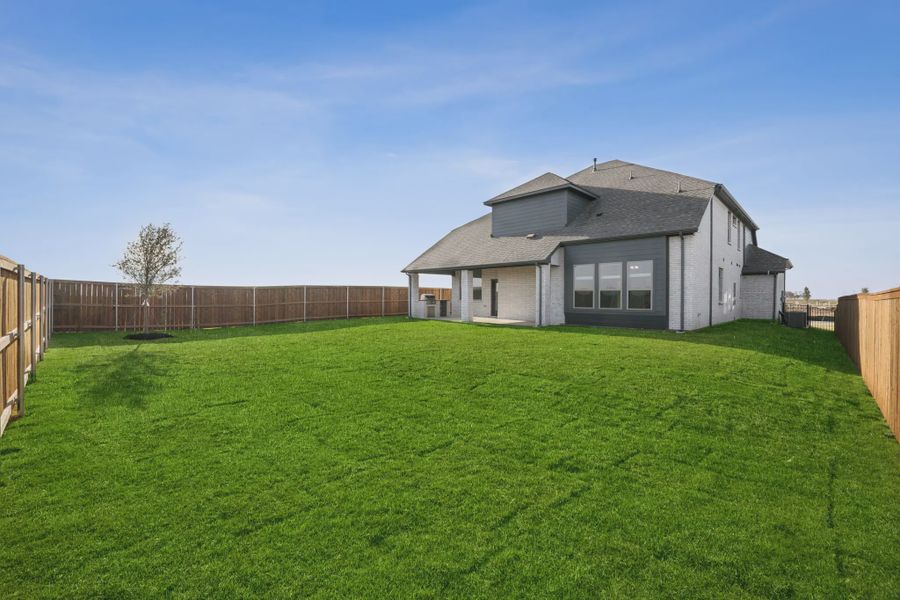 Representative exterior details of a home built from the Avalon by Chesmar Homes in Silo Mills, Joshua (Image 3).